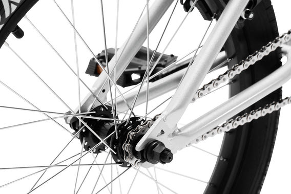 Tribal Spear Silver BMX, close up of rear hub on a white background