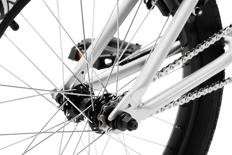 Tribal Spear Silver BMX, close up of rear hub on a white background