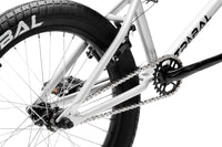 Tribal Spear Silver BMX, close up of rear wheel and rear triangle of frame on a white background