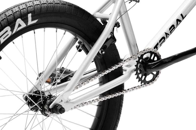 Tribal Spear Silver BMX, close up of rear wheel and rear triangle of frame on a white background