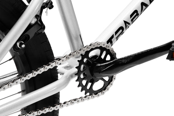 Tribal Spear Silver BMX, close up of rear sprocket and cranks on a white background