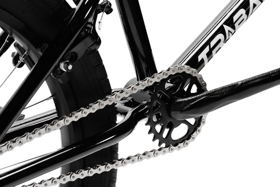 Tribal Spear Silver BMX, close up of rear sprocket and cranks on a white background