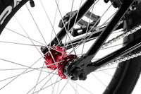 tribal trap black bmx bike rear hub and dropout on a white background