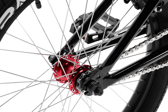 tribal trap black bmx bike rear hub and dropout on a white background