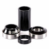 Set of black and silver bicycle bearings on a white background